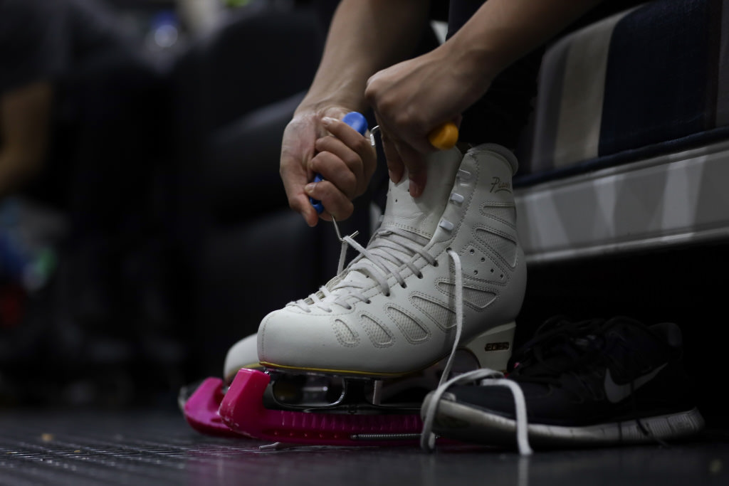 Lacing up ice skates