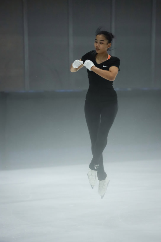 Aina Sorfina doing a double jump during training