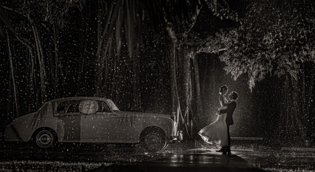 Wedding couple in the rain