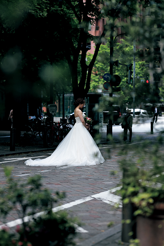 Bride in wedding gown on the street