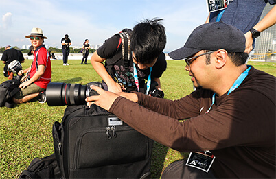 Photographers looking at a shot